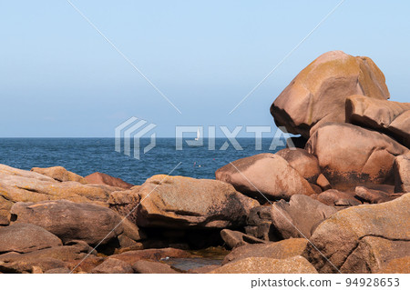 Boulders on the Pink Granite Coast in Brittany 94928653