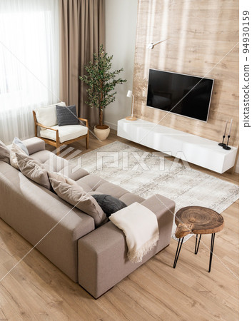 Isometric view of the interior of a new living room in light colors Isometric view of the interior of a new living room in light colors 94930159