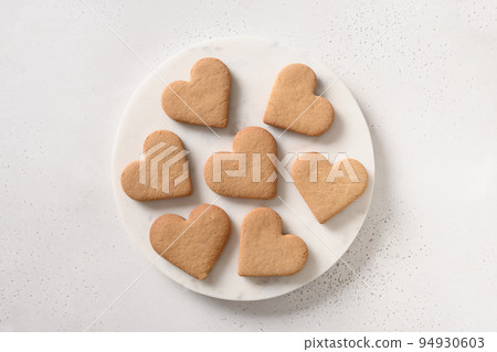 Valentine's Day heart shaped cookies on white background. 94930603