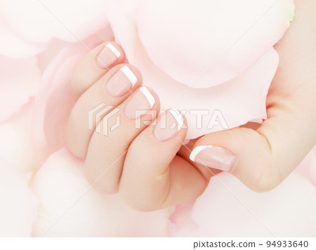 Close-up beautiful sophisticated female hands with 94933640