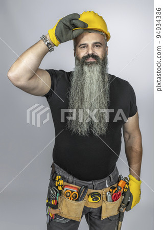 worker with tool belt 94934386