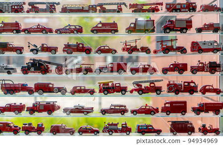 Many fire trucks background 94934969