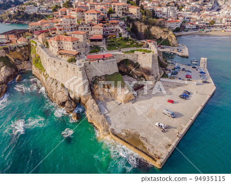 Amazing view on Ulcinj town in Montenegro. Clock Tower of Ulcinj Sahat Kulla. Lami Mosque. Ulcinj is a popular tourist destination in the summer on the southern Adriatic coast of Montenegro. Ulqin Amazing view on Ulcinj town in Montenegro. Clock Tower of Ulcinj Sahat Kulla. Lami Mosque. Ulcinj is a popular tourist destination in the summer on the southern Adriatic coast of Montenegro. Ulqin 94935115