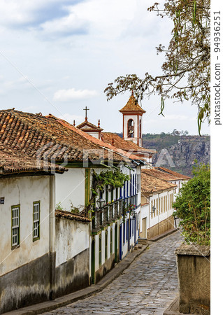 Cobbled street in the city of Diamantina with its colonial-style houses Cobbled street in the city of Diamantina with its colonial-style houses 94936251