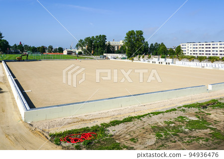 prepared base and concrete border for installation of inflatable playing arena, football hall 94936476