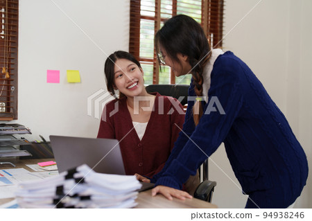 Group of Business woman and Accountant checking data document on digital tablet for investigation of corruption account. Anti Bribery concept Group of Business woman and Accountant checking data document on digital tablet for investigation of corruption account. Anti Bribery concept 94938246