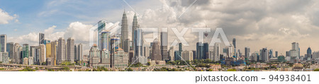 Kuala Lumpur skyline, view of the city, skyscrapers with a beautiful sky in the afternoon Kuala Lumpur skyline, view of the city, skyscrapers with a beautiful sky in the afternoon 94938401