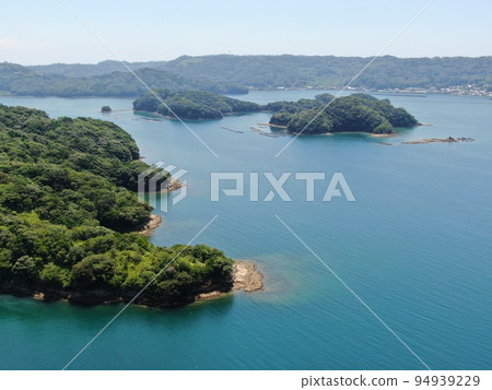 Aerial view of the beautiful coastline near Ojijima in Genkaicho 94939229