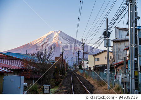 Mt.Fuji seen over the train tracks in Yamanashi prefecture autumn morning Mt.Fuji seen over the train tracks in Yamanashi prefecture autumn morning 94939719