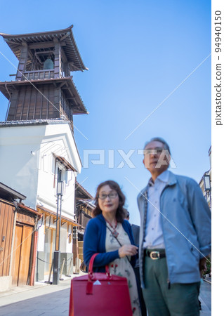 Senior couple enjoying sightseeing in Kawagoe Senior couple enjoying sightseeing in Kawagoe 94940150