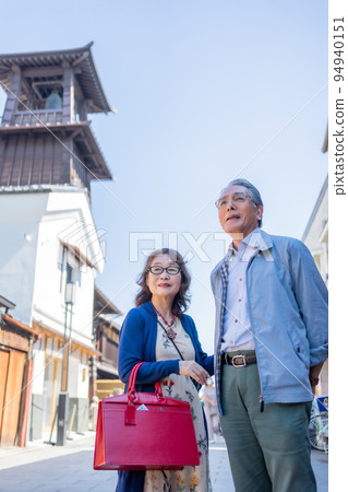 Senior couple enjoying sightseeing in Kawagoe Senior couple enjoying sightseeing in Kawagoe 94940151