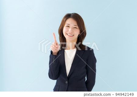 Woman pointing Woman pointing 94942149