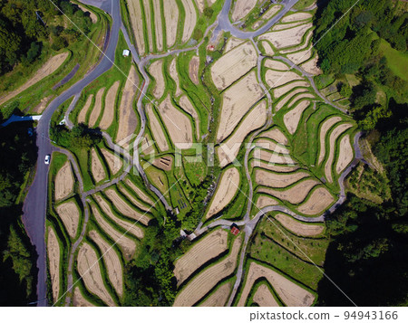 Aerial photography of the Tsuzura Rice Terraces with a drone 94943166