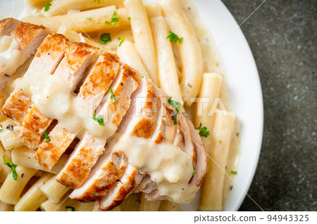 quadrotto penne pasta white creamy sauce with grilled chicken 94943325