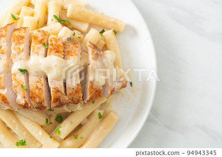 quadrotto penne pasta white creamy sauce with grilled chicken 94943345