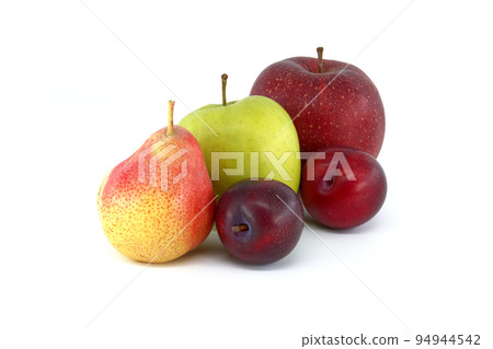 Pear, plums and apples over a white background Pear, plums and apples over a white background 94944542