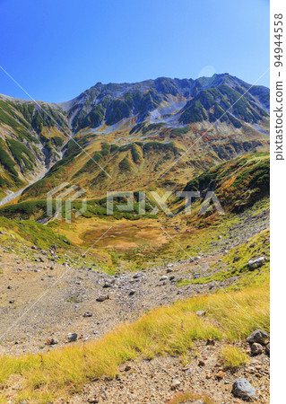 Tateyama Kurobe Alpine Route in full bloom in autumn colors Tateyama mountain range from Murododaira Tateyama Kurobe Alpine Route in full bloom in autumn colors Tateyama mountain range from Murododaira 94944558
