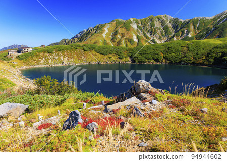 Tateyama Kurobe Alpine Route in full bloom in autumn colors Tateyama mountain range from Murododaira Tateyama Kurobe Alpine Route in full bloom in autumn colors Tateyama mountain range from Murododaira 94944602