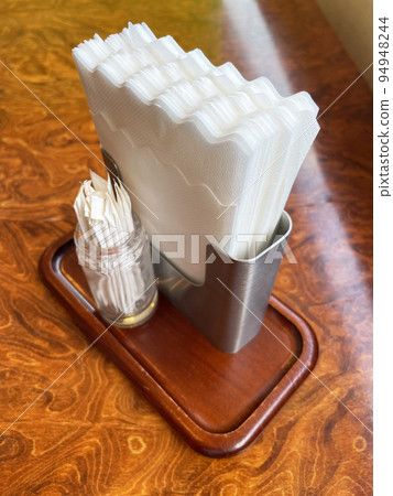 Restaurant paper napkins and toothpicks 94948244