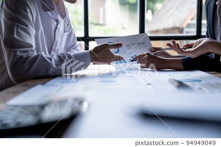 Business People Meeting using laptop computer, calculator stock market chart paper for analysis Planning. Conference Discussion Corporate Concept Business People Meeting using laptop computer, calculator stock market chart paper for analysis Planning. Conference Discussion Corporate Concept 94949049