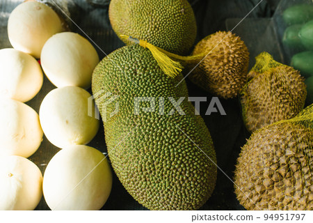 Jack fruit and durian in a shop window Jack fruit and durian in a shop window 94951797