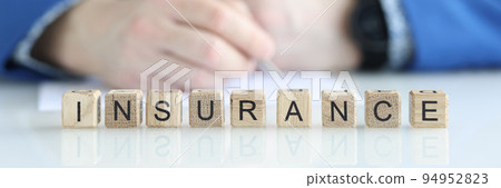 Realtor or real estate agent fills out mortgage loan and insurance document 94952823