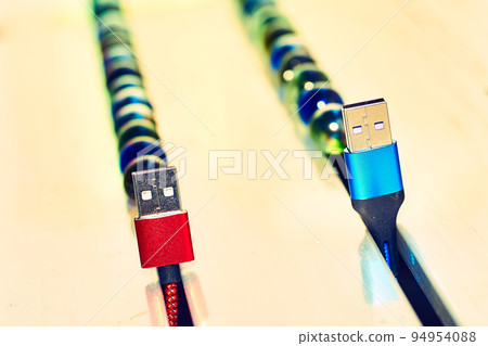 Connect and chat. Blue and red usb cables and colored balloons Connect and chat. Blue and red usb cables and colored balloons 94954088