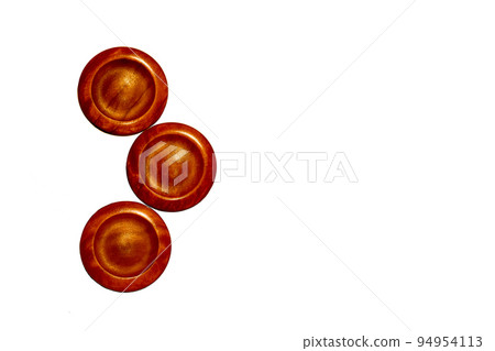 Three red copper wooden isolated circles. Elements of art and decoration 94954113