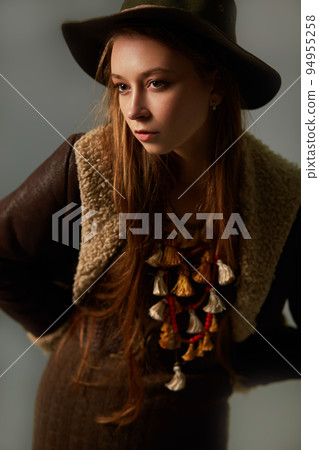 Fashion Model in the studio. Beautiful Sexy Woman In Stylish Fashionable Fall Clothes. Fashion Model in the studio. Beautiful Sexy Woman In Stylish Fashionable Fall Clothes. 94955258