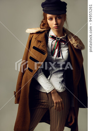 Fashion Model in the studio. Beautiful Sexy Woman In Stylish Fashionable Fall Clothes. Fashion Model in the studio. Beautiful Sexy Woman In Stylish Fashionable Fall Clothes. 94955261
