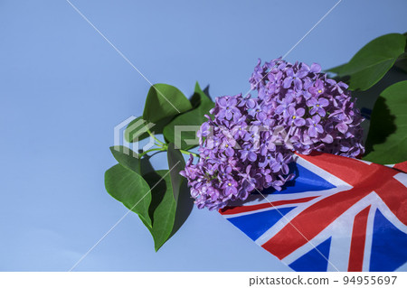 Creative british style background with flowers and united kingdom uk flag Creative british style background with flowers and united kingdom uk flag 94955697