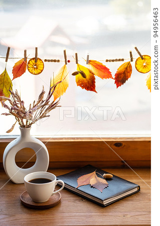 Autumn aesthetic still life on windowsill. Fall home decorating. 94956463