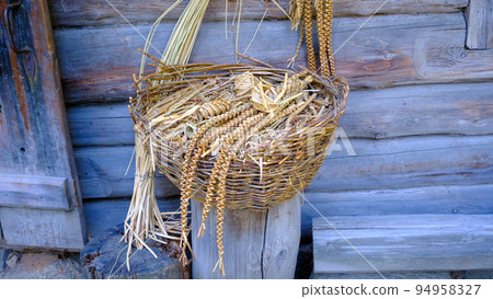 old-time straw-woven toys, home-made handicrafts. for performing rituals. put together a wicker basket old-time straw-woven toys, home-made handicrafts. for performing rituals. put together a wicker basket 94958327