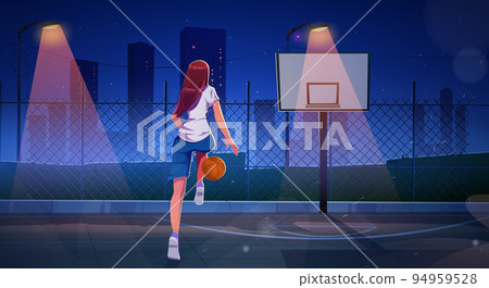 Girl playing basketball on outdoor court at night 94959528
