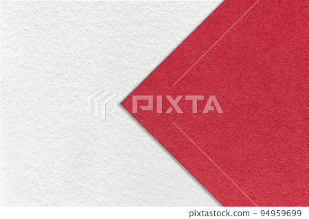 Texture of white paper background, half two colors with red arrow sign, macro. Structure of craft ruby cardboard. Texture of white paper background, half two colors with red arrow sign, macro. Structure of craft ruby cardboard. 94959699