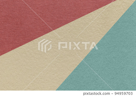 Texture of old craft beige, blue and maroon color paper background, macro. Vintage abstract cerulean cardboard. Texture of old craft beige, blue and maroon color paper background, macro. Vintage abstract cerulean cardboard. 94959703