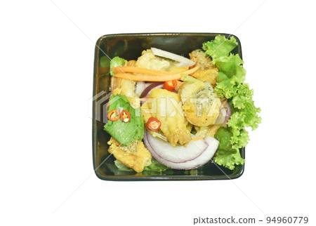 deep fried slice snake skin gourami spicy and sour Thai salad on bowl deep fried slice snake skin gourami spicy and sour Thai salad on bowl 94960779