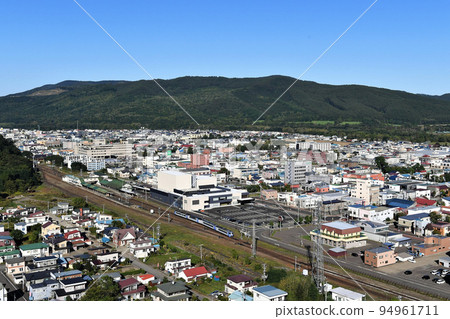 The streets of Engaru and the JR limited express "Taisetsu" 94961711