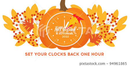 Daylight saving time, 2022 concept. Alarm clock and calendar with the date of November 6 on the pumpkin Daylight saving time, 2022 concept. Alarm clock and calendar with the date of November 6 on the pumpkin 94961865