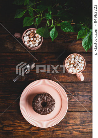 Stack of Chocolate Donuts and Hot Chocolate with Marshmallow 94962222