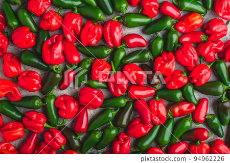 Background of Colorful Jalapeno and Habanero Peppers Background of Colorful Jalapeno and Habanero Peppers 94962226