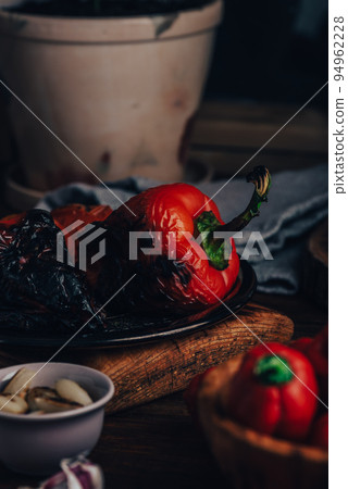 Charred Bell Pepper, Habanero Peppers and Roasted Garlic for Hot Chili Sauce Charred Bell Pepper, Habanero Peppers and Roasted Garlic for Hot Chili Sauce 94962228