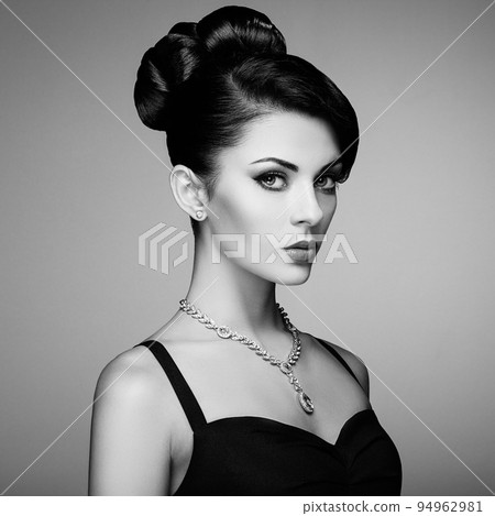 Fashion portrait of young beautiful woman with elegant hairstyle 94962981