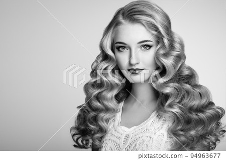 Black and white photo of beautiful woman with elegant hairstyle 94963677