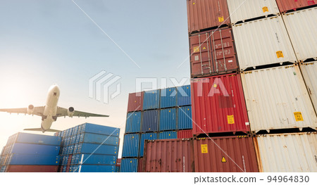 Air logistics. Cargo airplane flying above stack of logistic container. Cargo and shipping business. Container ship for export logistic. Logistic industry from port to port. Freight transportation. Air logistics. Cargo airplane flying above stack of logistic container. Cargo and shipping business. Container ship for export logistic. Logistic industry from port to port. Freight transportation. 94964830