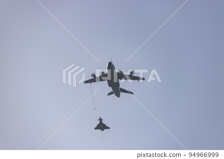 Hunt. Airplane. Military vehicle. Spanish Air Force rehearsing for the National Day of October 12 through the streets of the city of Madrid. MADRID, SPAIN - OCTOBER 5, 2022. 94966999