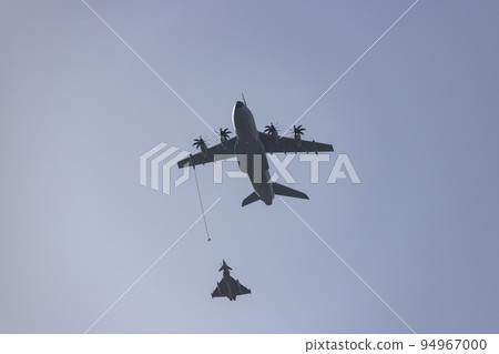 Hunt. Airplane. Military vehicle. Spanish Air Force rehearsing for the National Day of October 12 through the streets of the city of Madrid. MADRID, SPAIN - OCTOBER 5, 2022. Hunt. Airplane. Military vehicle. Spanish Air Force rehearsing for the National Day of October 12 through the streets of the city of Madrid. MADRID, SPAIN - OCTOBER 5, 2022. 94967000