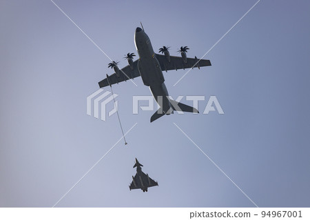 Hunt. Airplane. Military vehicle. Spanish Air Force rehearsing for the National Day of October 12 through the streets of the city of Madrid. MADRID, SPAIN - OCTOBER 5, 2022. Hunt. Airplane. Military vehicle. Spanish Air Force rehearsing for the National Day of October 12 through the streets of the city of Madrid. MADRID, SPAIN - OCTOBER 5, 2022. 94967001
