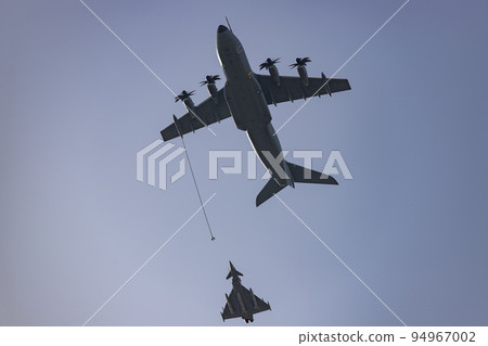 Hunt. Airplane. Military vehicle. Spanish Air Force rehearsing for the National Day of October 12 through the streets of the city of Madrid. MADRID, SPAIN - OCTOBER 5, 2022. 94967002