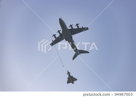 Hunt. Airplane. Military vehicle. Spanish Air Force rehearsing for the National Day of October 12 through the streets of the city of Madrid. MADRID, SPAIN - OCTOBER 5, 2022. 94967003